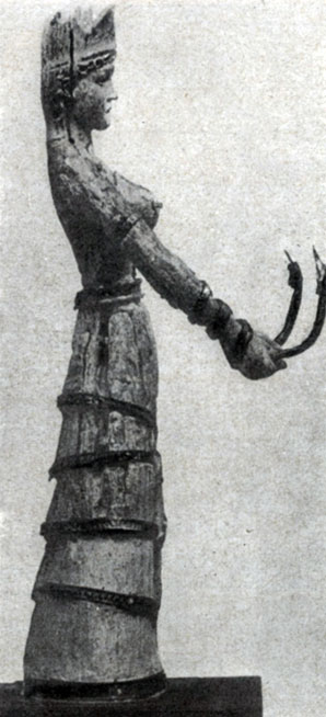  106 а. Богиня со змеями. Статуэтка из слоновой кости с золотом. Середина 2 тысячелетия до н. э. Бостон. Музей изящных искусств. 